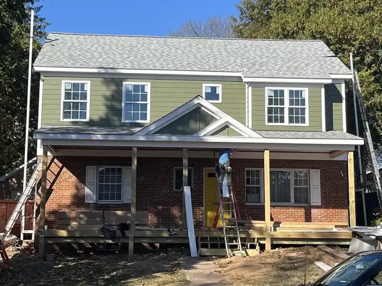 Setting the porch roof on second story modular addition