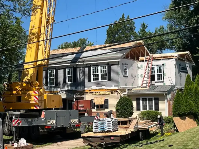 crane lifting second story vienna addition