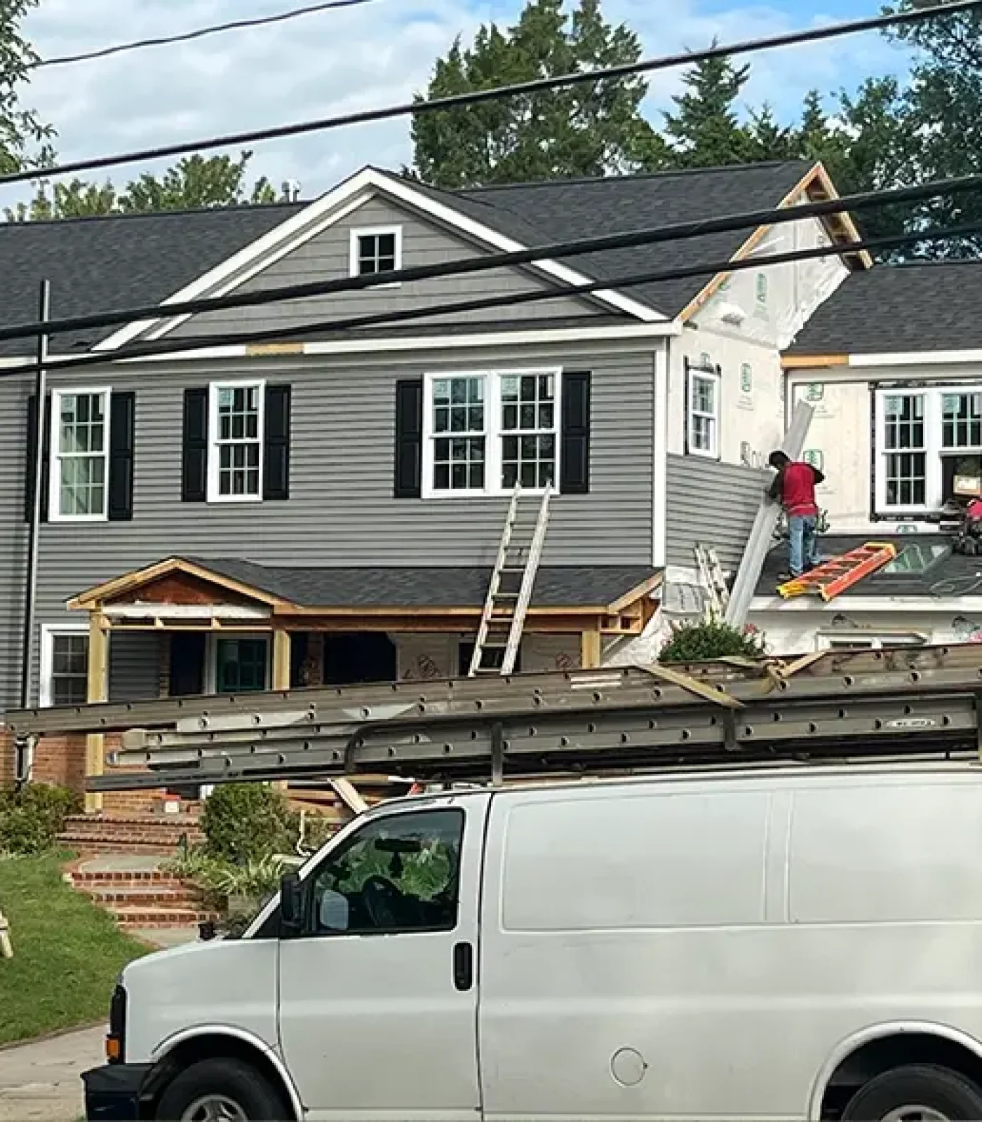 Vienna second story addition with siding being installed